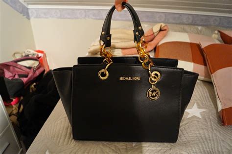 michael kors laukut feikki|Michael Kors USA: Designer Handbags, Clothing, Menswear, .